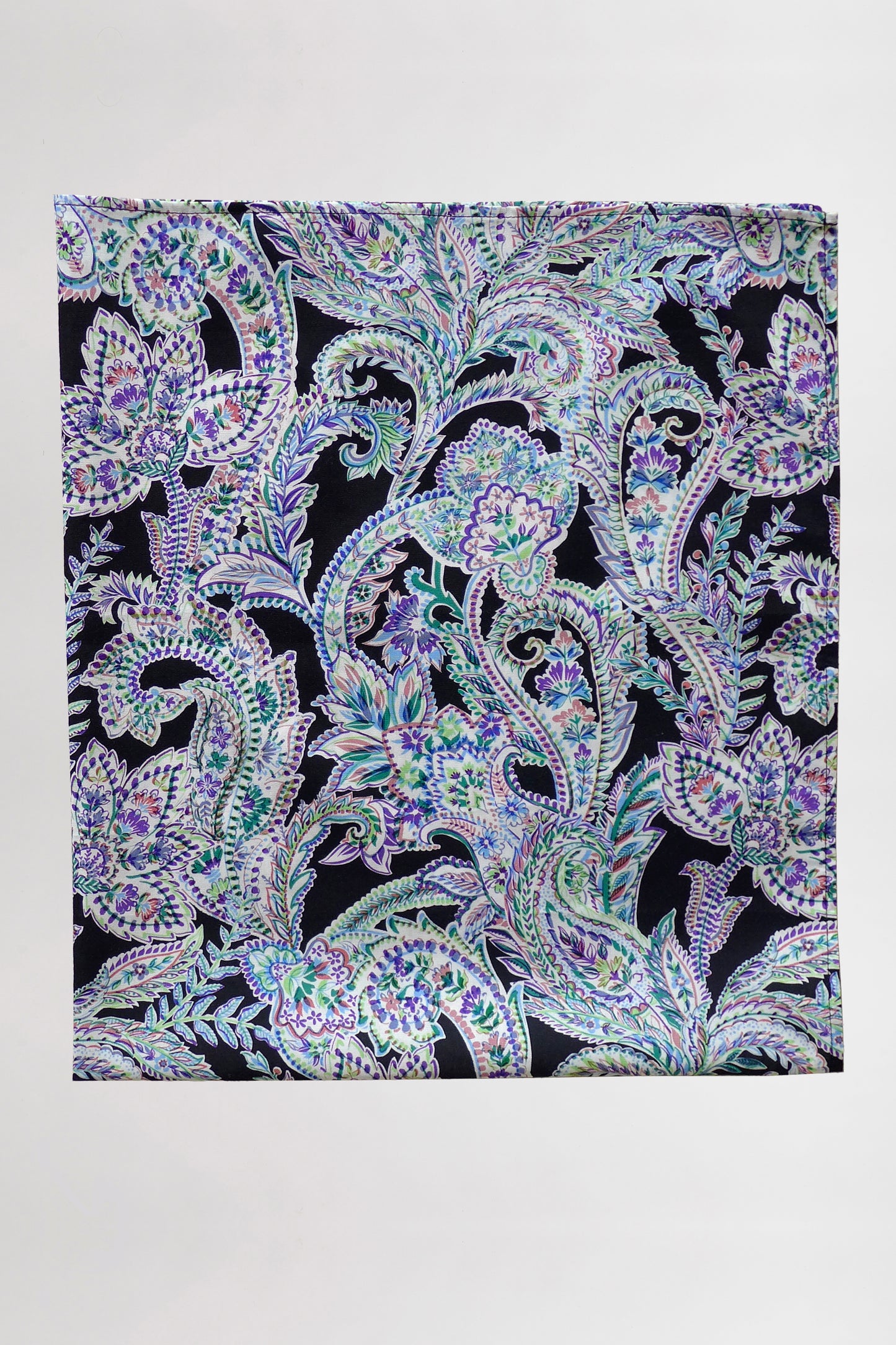 Paisley patterned scarf on a white background