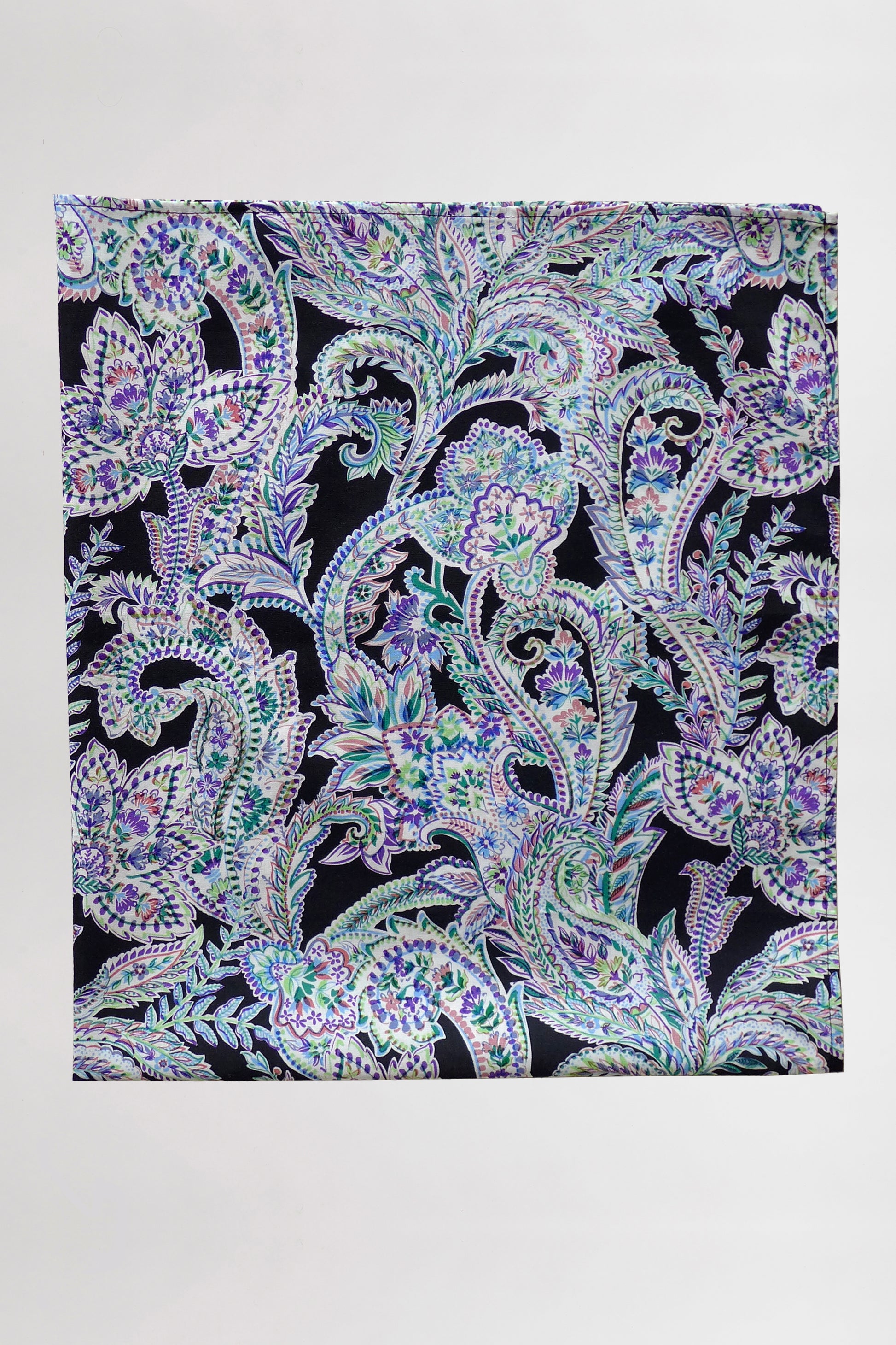 Paisley patterned scarf on a white background